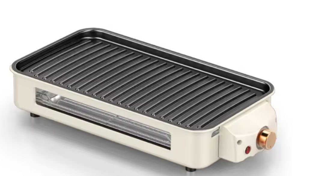 Griglia elettrica da tavolo color panna con piastra rigata antiaderente e manopola di regolazione della temperatura